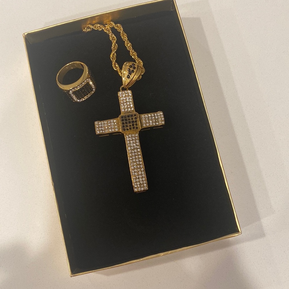 Big cross necklace with matching ring 18k gold plated stainless steel.